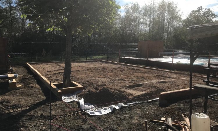 Réalisation d'un terrain de pétanque chez un particulier à Simandre